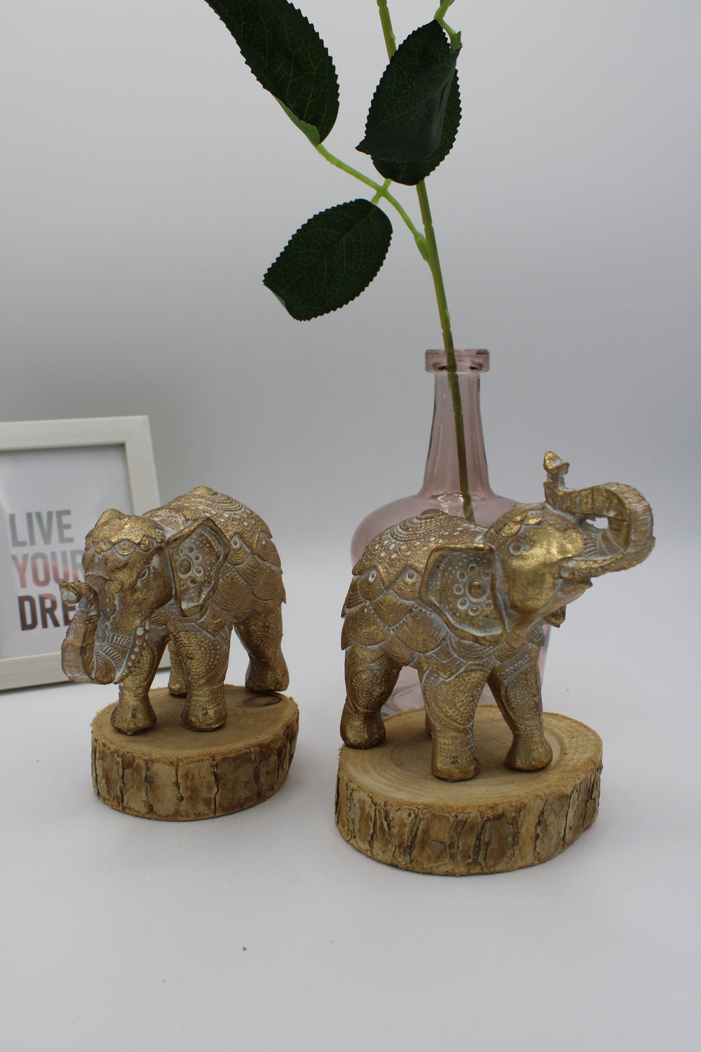 2 Standing elephant figurines in gold color